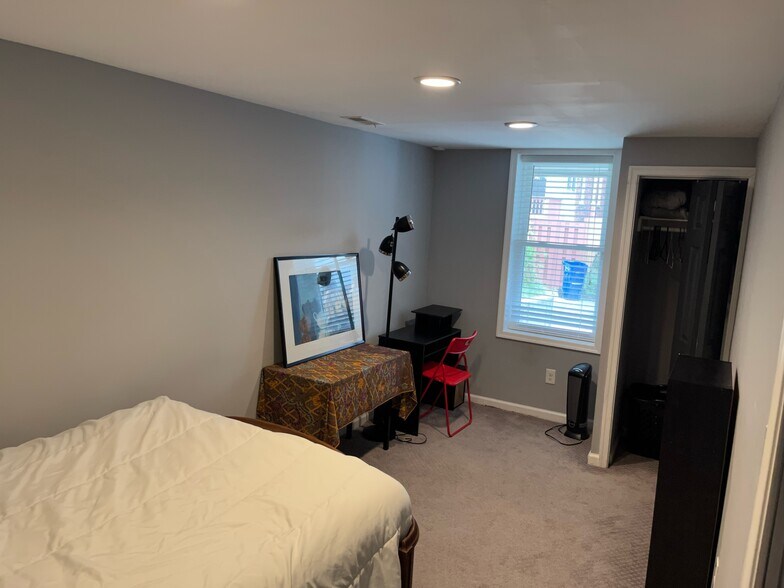 Large room with full-sized window and closet - 607 Quintana Pl NW