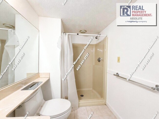 Building Photo - Spacious 2BR/2BA Condo with Garage, Balcony, Pool & Mine Falls Access