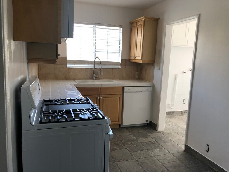 Updated Kitchen - Microwave, Range & Refrigerator - 5727 S Corning Ave