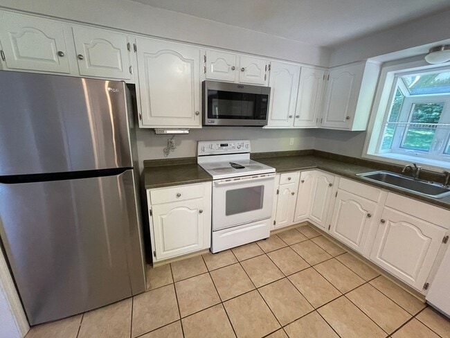 Building Photo - Beautiful 4 Bedroom House *w/ an In-Law* in Cheshire! Garage Parking, Central Air, & a Beautiful ...