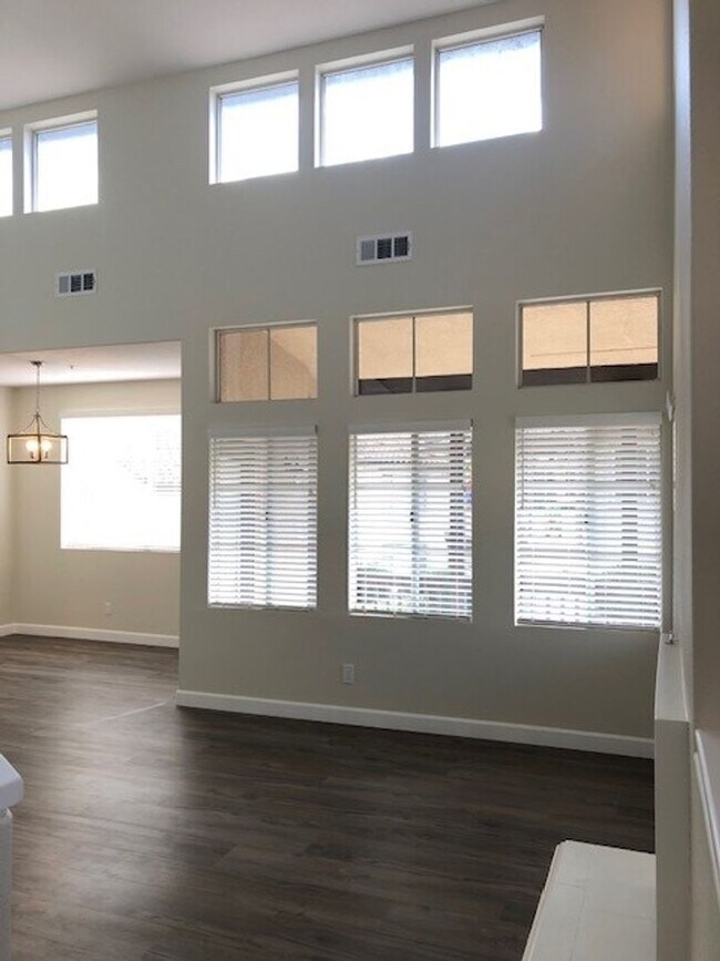 Building Photo - PICTURE PERFECT 2 BR/2 BATH PLUS LOFT END UNIT CONDO WITH DIRECT ACCESS 2 CAR GARAGE