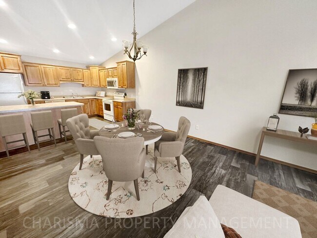 Building Photo - 4 BEDROOM, 2 BATH TOWN HOME, PET FRIENDLY, AMENITY FILLED, DOUBLE ATTACHED GARAGE!
