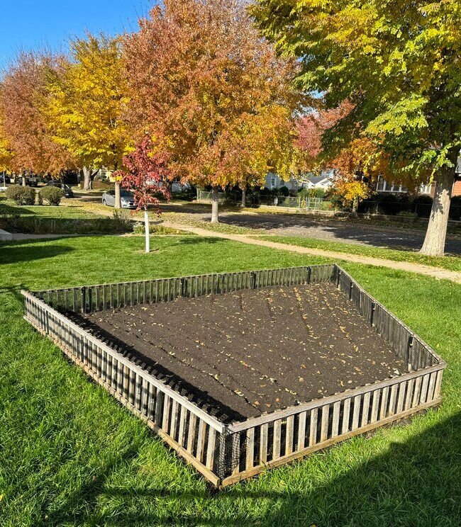179 sq feet of fenced garden space in the front yard. - 924 Eleanor Ave
