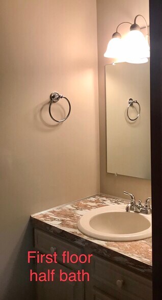 Half Bath off Kitchen - 917 Lattavo St NE