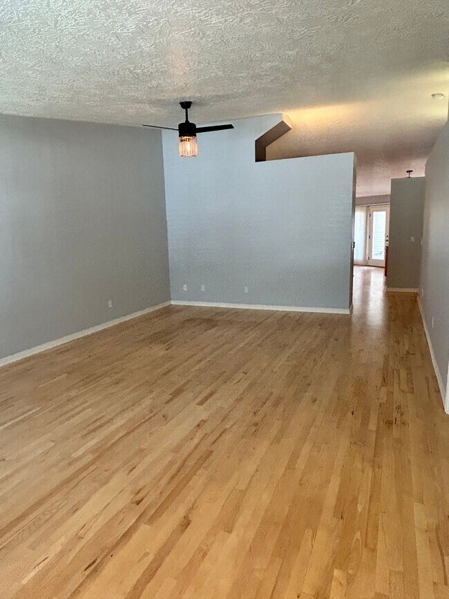 Building Photo - Spacious Duplex with 3-Car Garage & Private Patio!