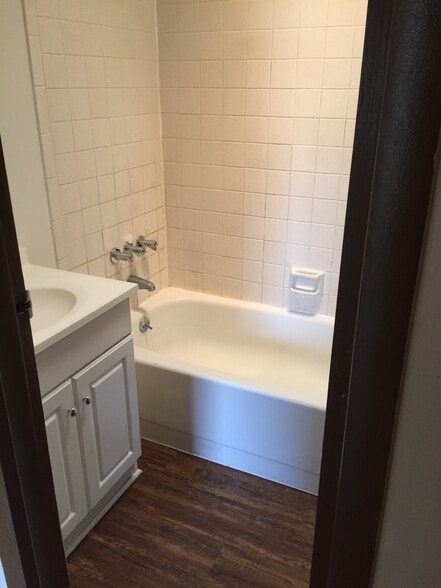 Bathroom. NOTE: Old bathtub and walls have been replaced. - 2418 S San Gully Rd