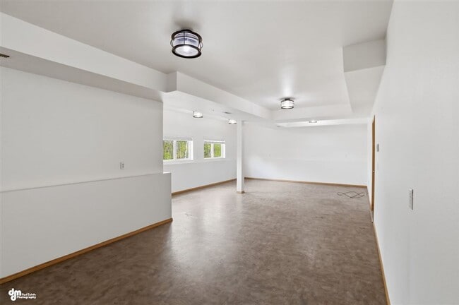 Building Photo - Luxury Alaska Living with Room to Spread Out — Mountain Views, Massive Garage & Incredible Commut...