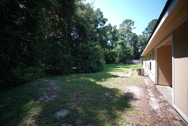 Building Photo - 6315 S Placid Pl