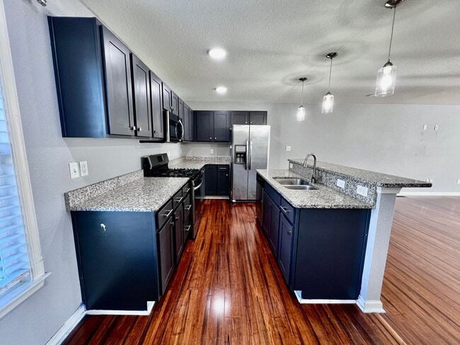 Building Photo - Tri-Level Condo – Pets Welcome, Washer & D...