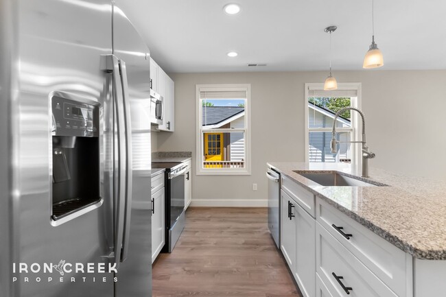 Building Photo - Bright and Modern: New Construction Three-...