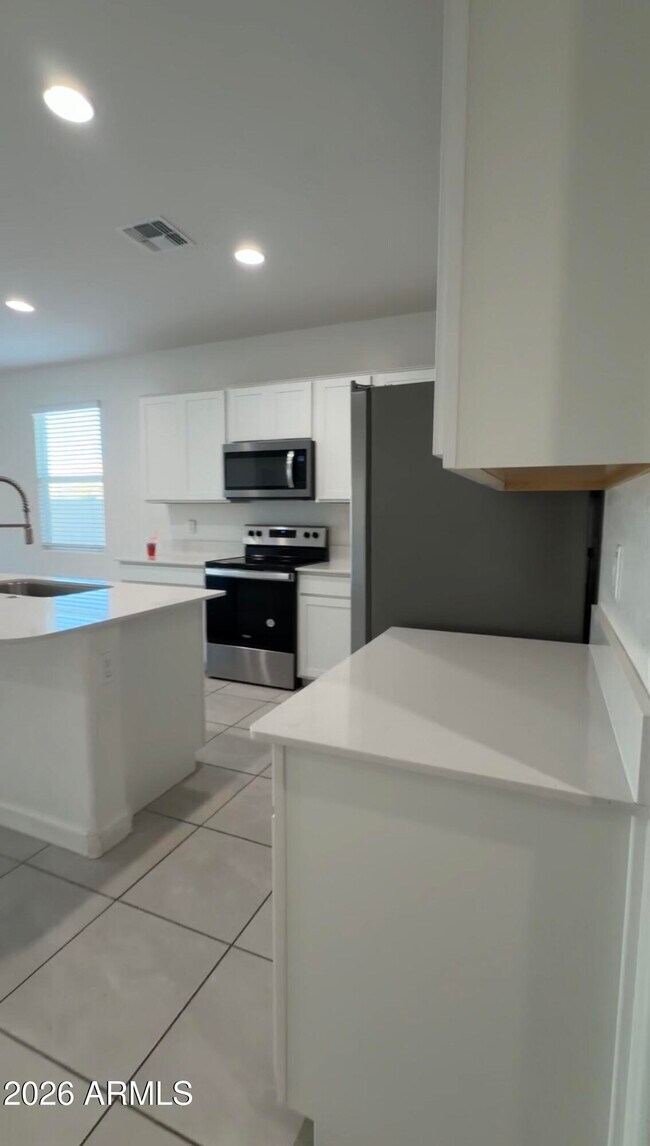 Building Photo - 24066 W Flores Dr