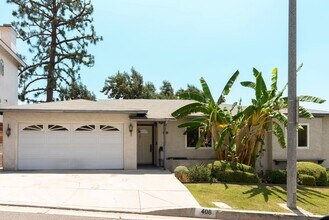 Building Photo - Spacious 3 Bed · 2 Bath Hillside Home — Mo...