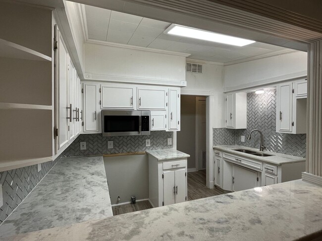 Building Photo - UPDATED FOUR BEDROOM PLUS BONUS ROOM!!