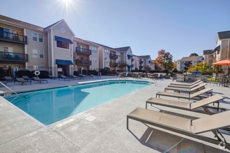 Building Photo - Quad Apartment Homes