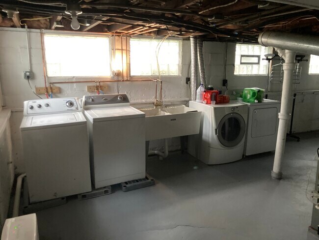 Laundry located in the basement along with extra fridge - 1265 Jackson Ave