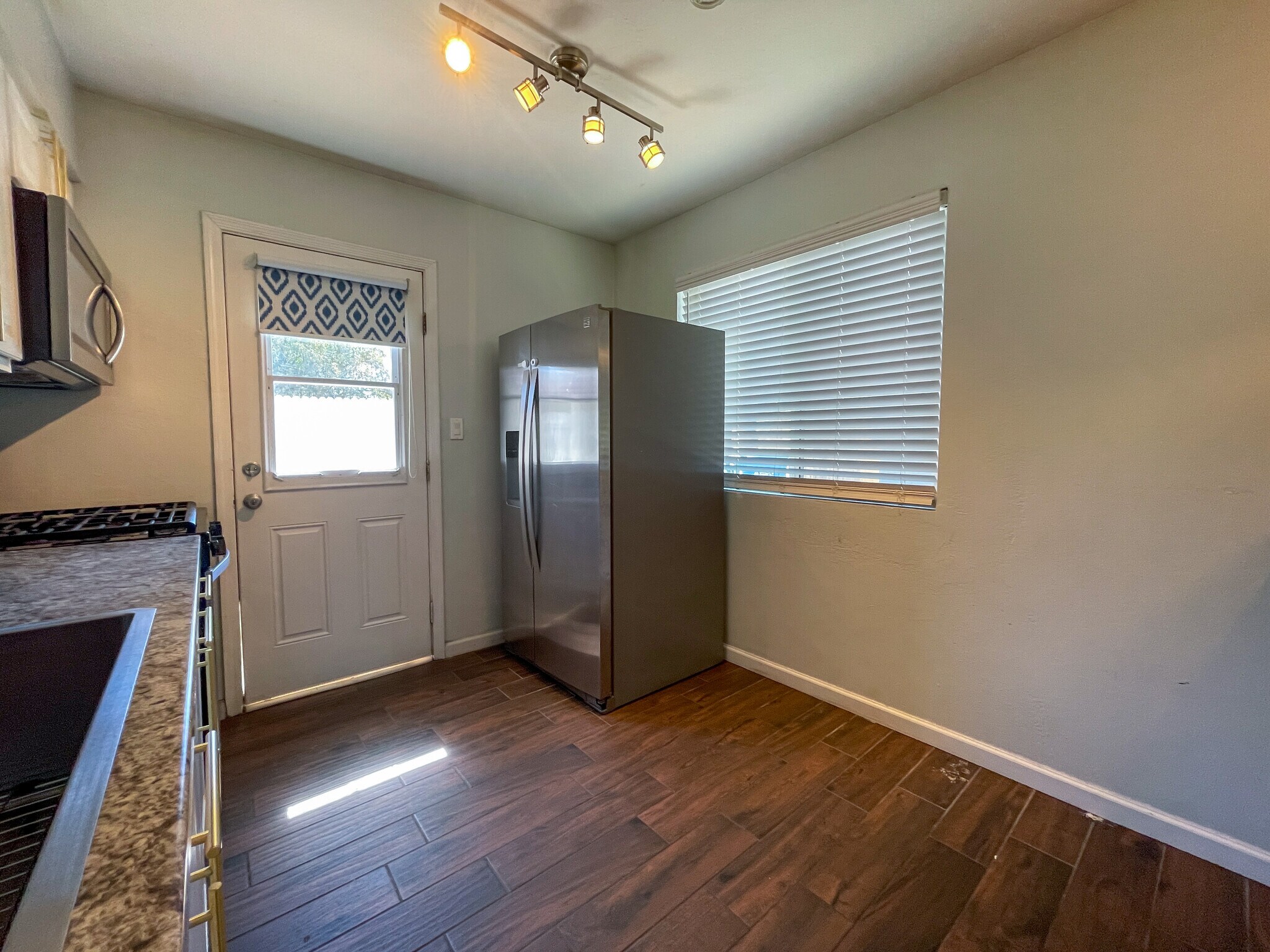 Stainless steel fridge - 4615 N 14th St
