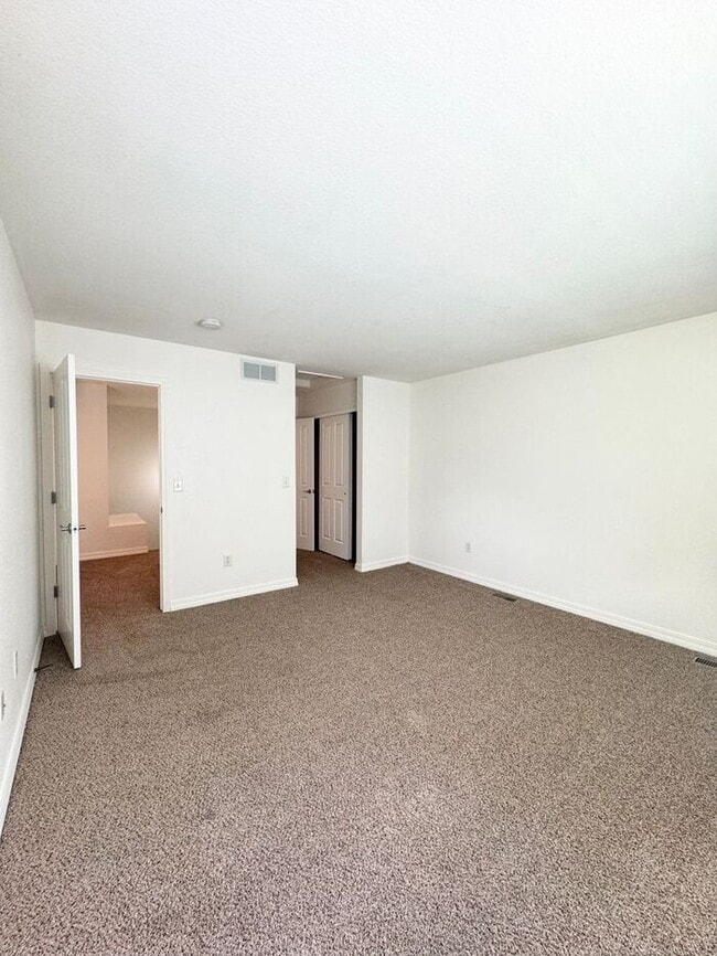 Building Photo - 2 Bedroom, 1.5 Bathroom Condo Only Seconds...