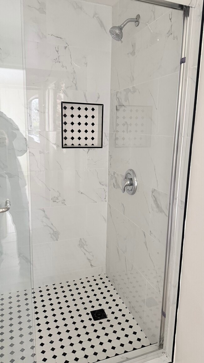 Brand new tiles - 7617 De Longpre Ave