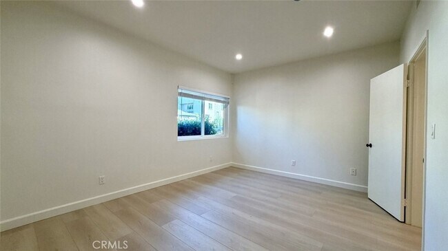 Building Photo - 310 E Providencia Ave