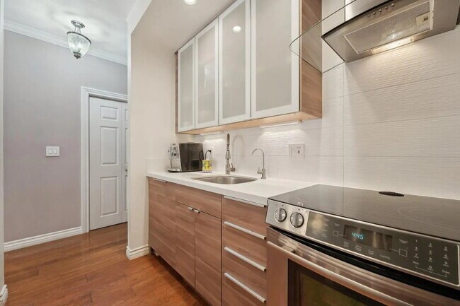 Building Photo - "Chic 1-Bed Oasis with Movie Room & Pool i...