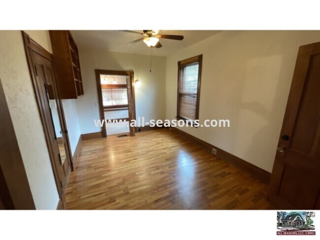 Building Photo - This adorable and spacious main level triplex unit is centrally located and a quick drive or bike ri