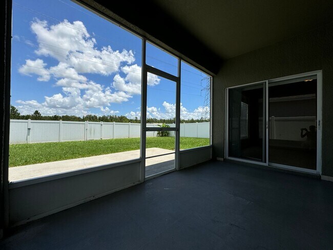 Building Photo - Beautiful 3/2 home near Lake Nona ~ Fenced In Yard ~ LVP & Tile Flooring ~ Community Pool!