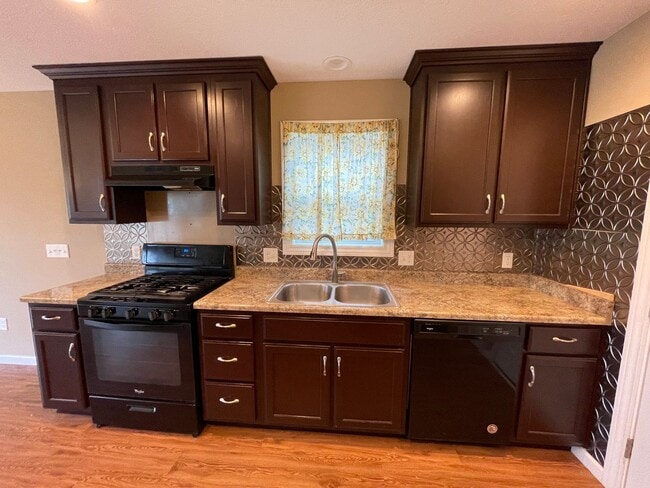 Building Photo - Home For Rent By Capital Property Management