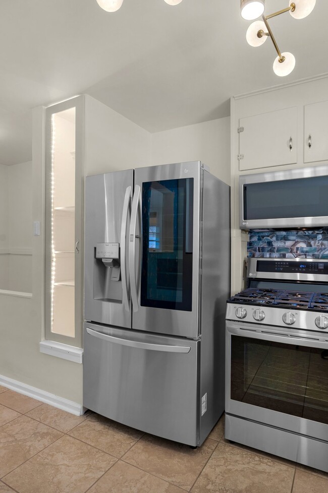 Ample fridge space, gas range with air fryer built in. - 114 N Foote Ave