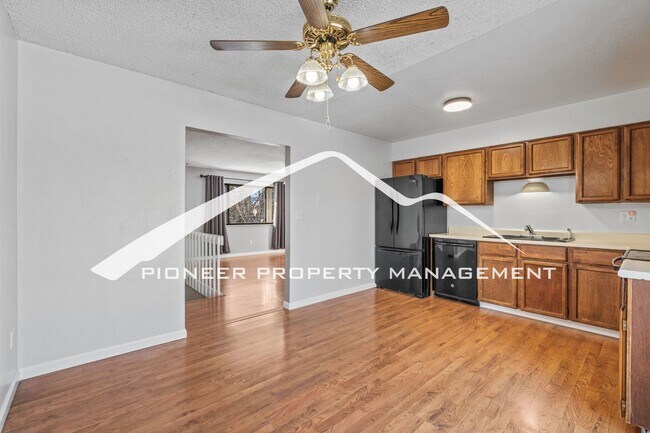 Building Photo - Spacious Split-Level Home in D20 with Mountain Views, 2 Car Garage, Fenced Yard and AC!