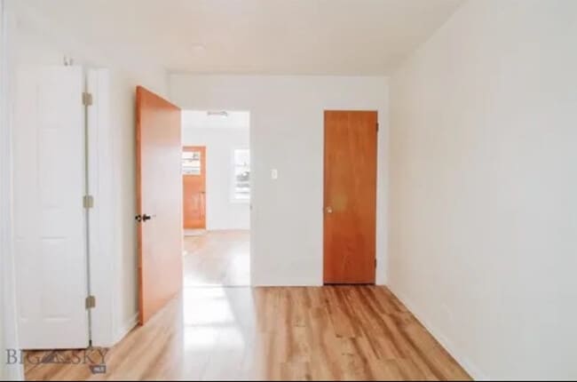 Bedroom with narrow but deep closet - 2025 Grand Ave