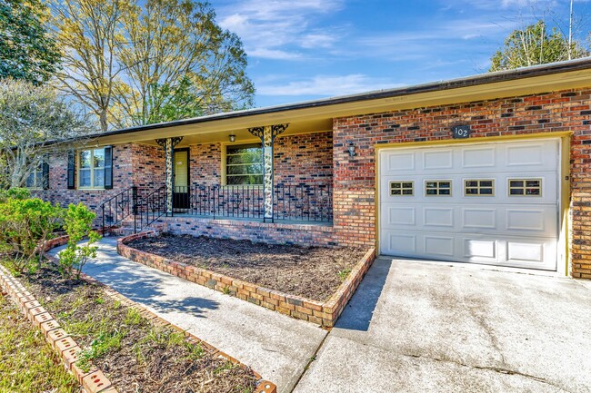 Primary Photo - Single story, brick, ranch-style home clos...