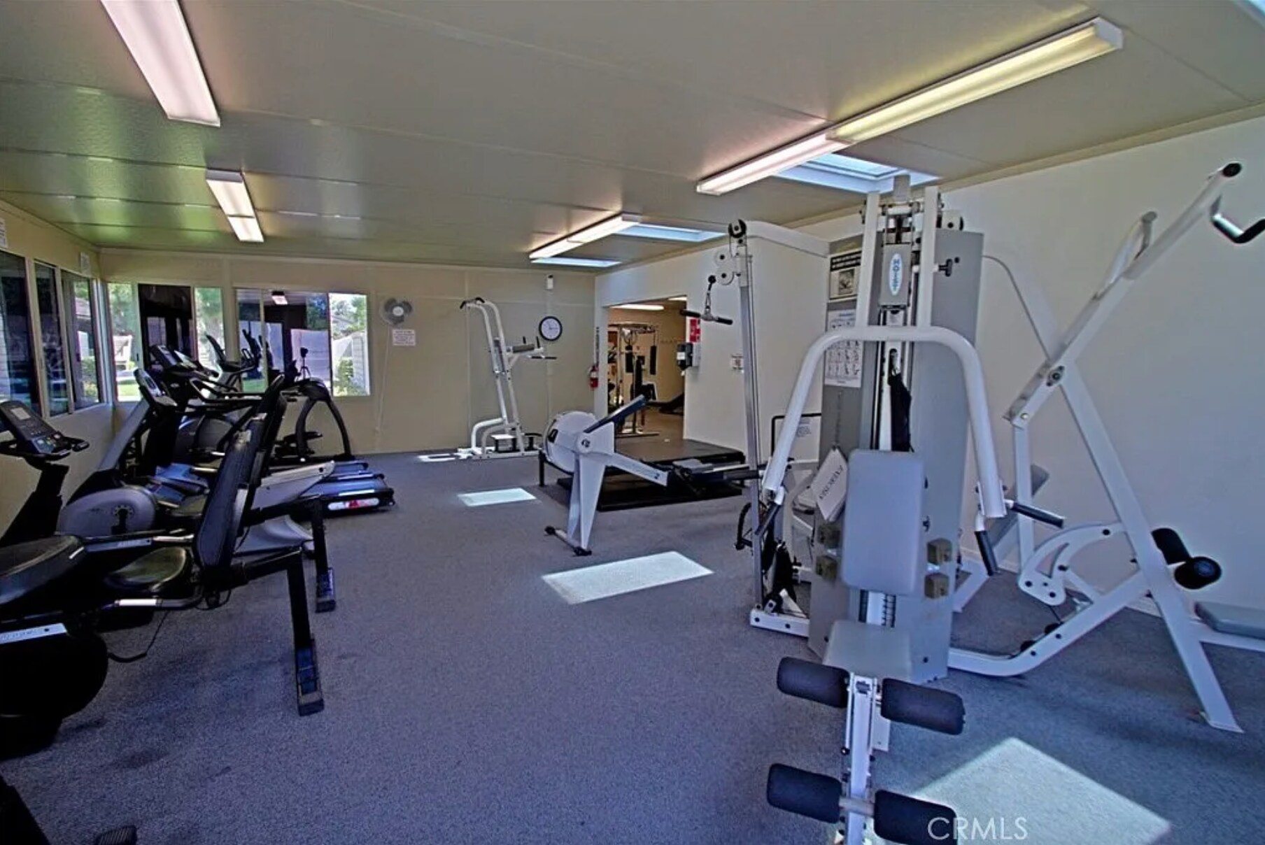 Fitness gym & weight room. - 8566 Larkhall Cir