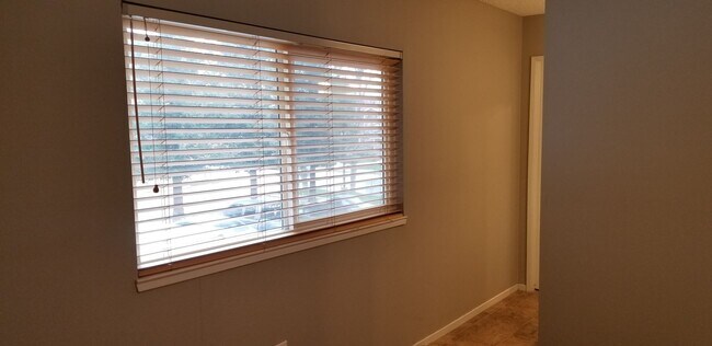 Building Photo - Updated Two Bedroom Condo with Warm Fireplace