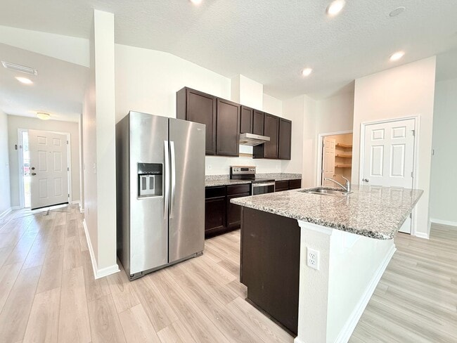 Building Photo - Beautiful 4BR Home with Open Floor Plan & Fully Fenced Backyard