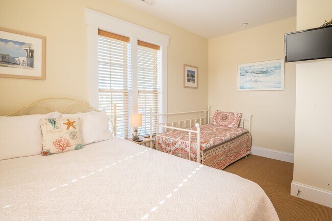 Building Photo - ENJOY OCEAN BREEZES FROM THIS FURNISHED OFF-SEASON OCEAN VIEW CONDO W/BALCONIES