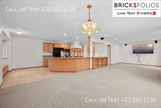 Building Photo - Welcome to Tukwila Haven – Open Concept Home Near Sound Transit!