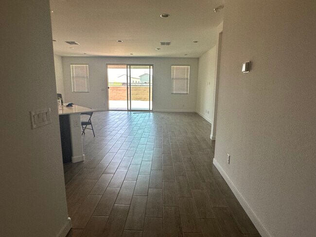 Living room with tiles flooring - 3110 N 199th Dr