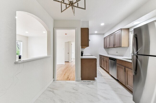 Building Photo - Stunning Single Family Home | 4BR/2BA | 1-Car Covered Parking | Fenced backyard