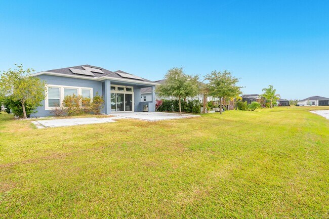 Building Photo - Luxurious Solar Powered 4 Bedroom, 3 Bath Waterfront Home with office & Upgrades Galore!