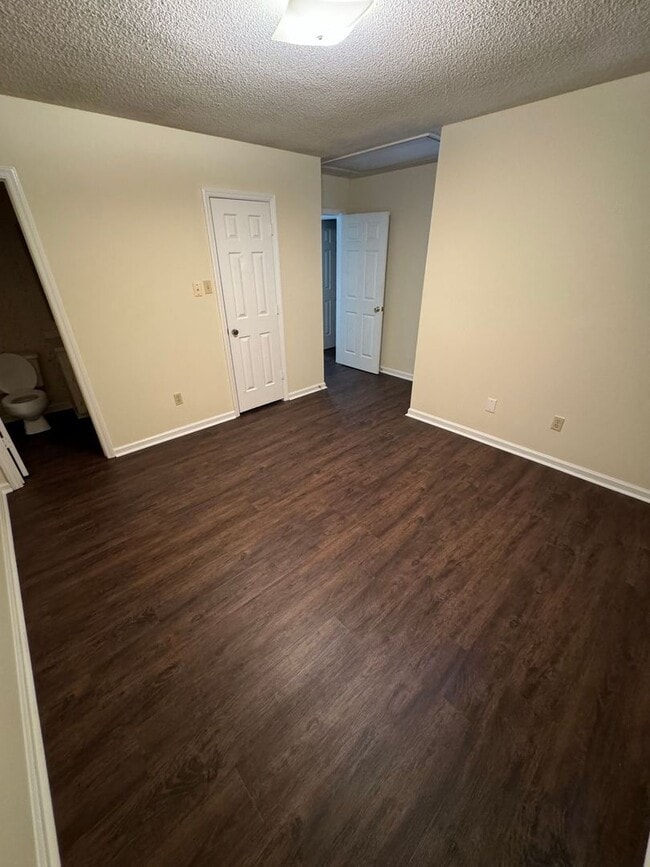 Building Photo - Two-Bedroom, 1.5 Bathroom Corner Condo at ...