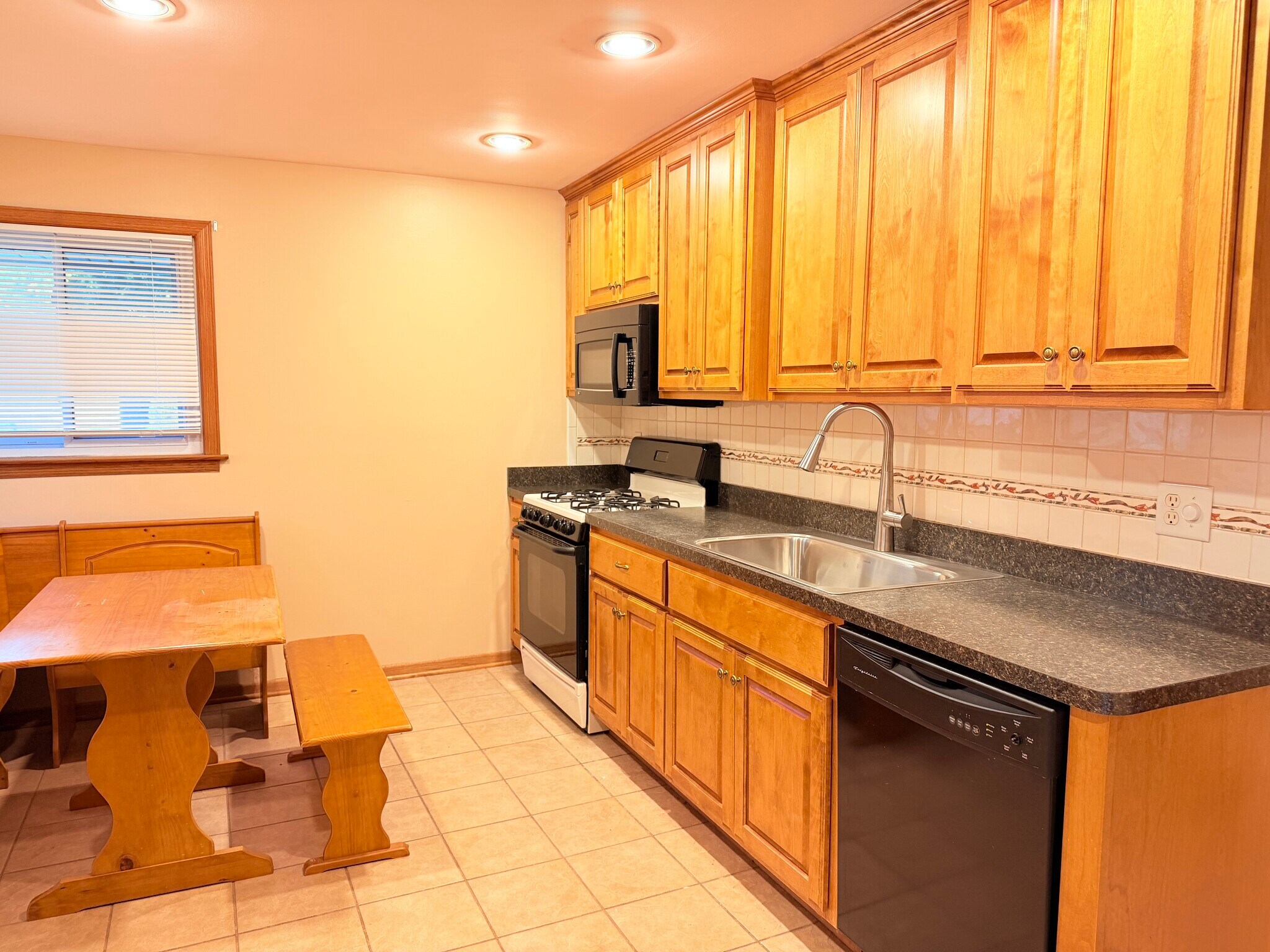 Spacious kitchen, dishwasher, new sink - 12416 S 44th Ct