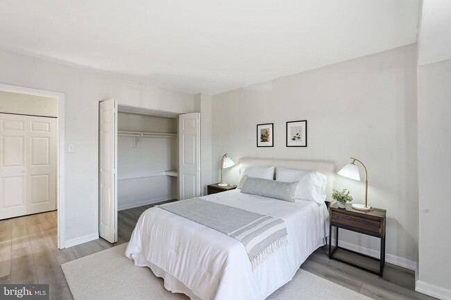 Building Photo - Welcome to this rarely available and beautifully updated ground-level condo offering the perfect ...