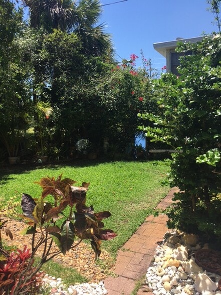 Garden yard area outside apartment - 649 Royal Palm Blvd