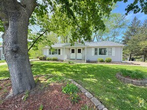 Building Photo - Two Bedroom Duplex with Heat Included! Nea...