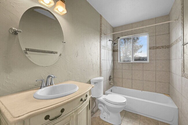 Building Photo - $1,495, 2-bed, 1.5 bath Unit in CO Springs with Assigned Parking Spot.