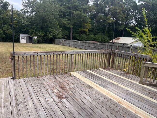 Building Photo - Outdoor Living Dream: Ranch-style home with Deck & Yard