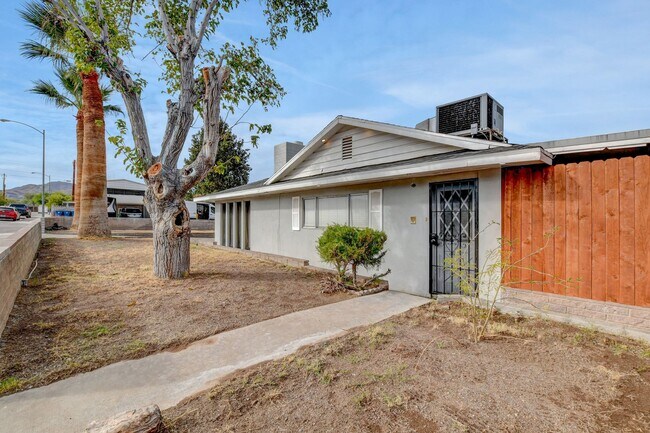 Building Photo - UNIQUE SINGLE FAMILY HOME! - No HOA, Car Lift, RV Parking and Nice Backyard