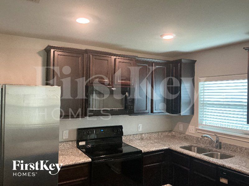 Building Photo - 14219 Chaps Dr