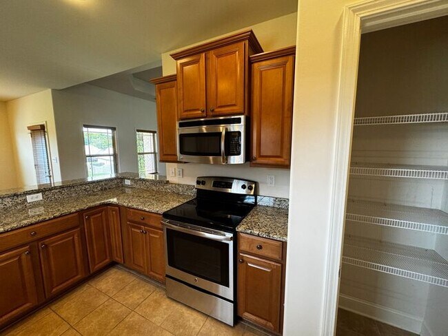 Building Photo - Available now in amazing location