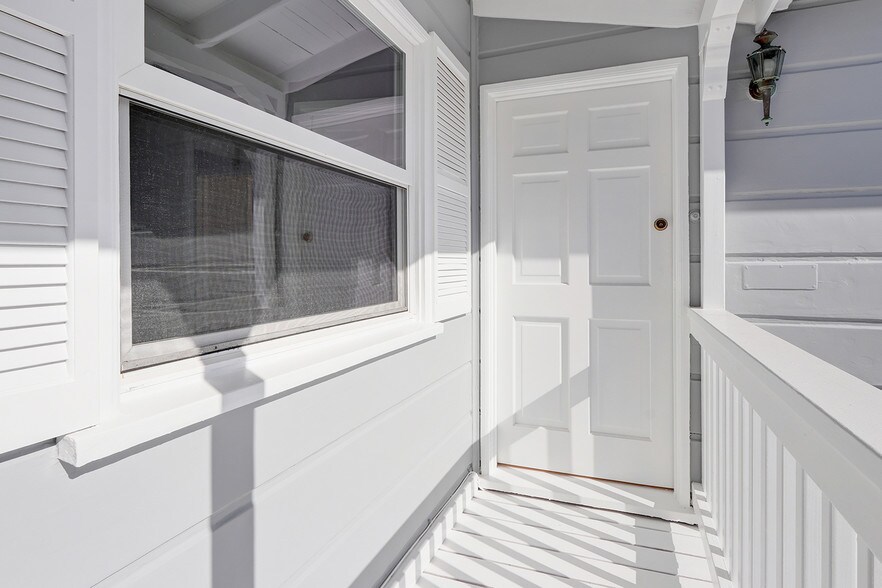 upstairs porch and front door - 423 28th St